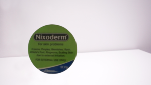 1727013038_NIXODERM-removebg-preview.png NIXODERM TIN 17.7G